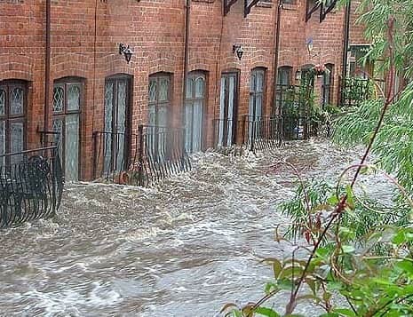The River Loxley floods Rudyard Mews, near Langsett Road, Hillsborough, in 2007.