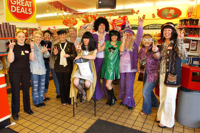 Join us at Kwik Save in 2004.
Staff were dressed in 70s outfits to raise money for Children In Need.