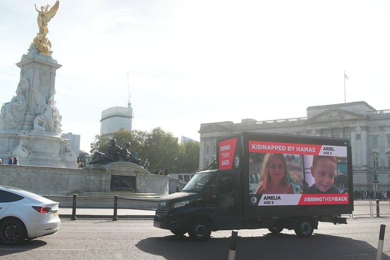 As well as projecting the images on prominent buildings, the group has also used major billboard signs and driven mobile billboards around the capital