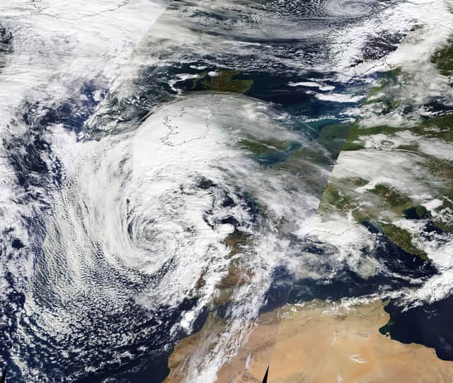 A satellite image shows progress of Storm Babet as UK braced for extreme weather.