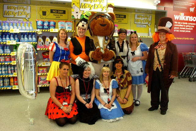 Staff at the Wilkinson's store in The Galleries in 2013.
They were in fancy dress with Miles the Air Ambulance mascot, celebrating the store's first birthday.