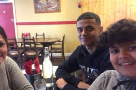 Qasem Fara, from Heeley, Sheffield, with his younger brother Qayis, who died of bone cancer aged just 16, and their mother Wesam Farah. Qasem is stranded in Gaza as it comes under aerial bombardment by Israel, and his mum fears for his life.