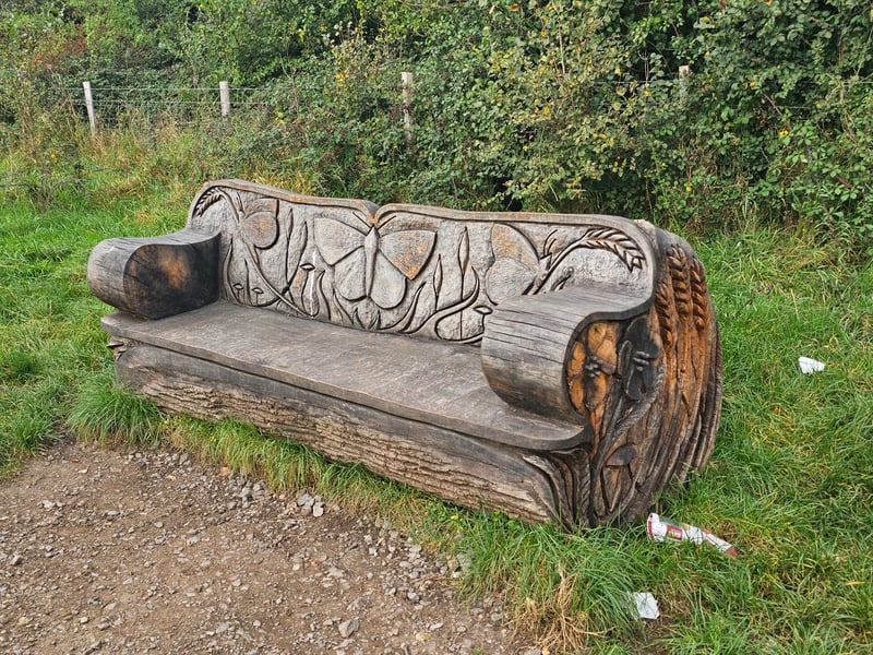 The intricate bench features a trio of butterflies and a subtle duo of mice on either side. The bench is located near The Vench Lockleaze Youth and Playspace and Community Centre and can be tracked with Google Maps.