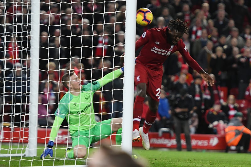 Origi had many iconic moments but his late tap-in to settle the Merseyside Derby was one of the sweetest. Van Dijk's late effort sliced high into the sky which looked to be heading for a goal kick. But the ball swirled in the sky and Pickford looked concerned; he leapt up to deal with the ball which landed on the crossbar and his intervention spilled it into Origi, who applied the finish from a yard.  Klopp stormed the pitch to celebrate with Alisson as Jamie Carragher yelled 'Look at Jurgen Klopp' on commentary in a truly excitable and dramatic  moment. 