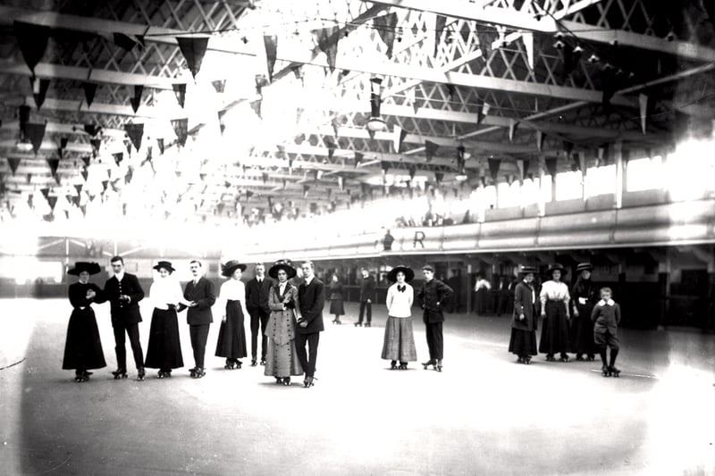 Photograph showing an indoor skating rink at South Shields taken in c.1910 with well dressed patrons posing for the photograph (Newcastle Libraries)