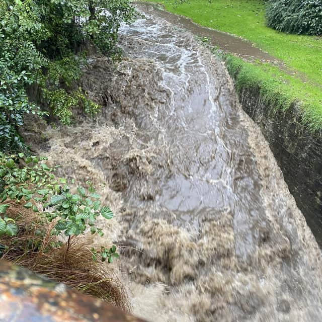 Water has been videoed rushed through the popular parks. 