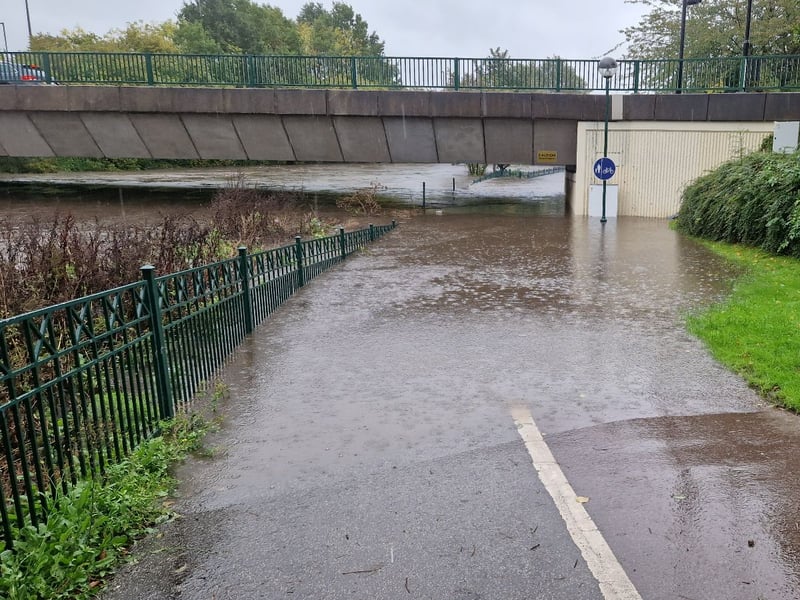 The path under Meadowhall 
Road bridge flooded during Storm Babet