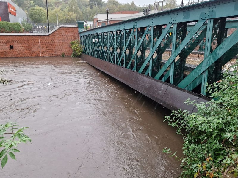 Hadfield Bridge over the River Don in Sheffield closed due to rising water levels during Storm Babet