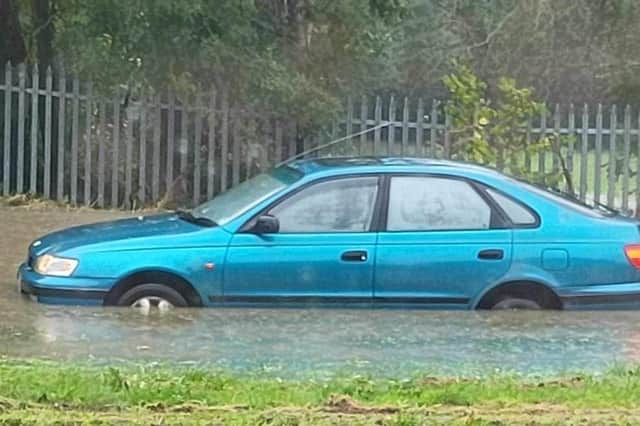 A car was abandoned in flood water in Jordanthorpe.