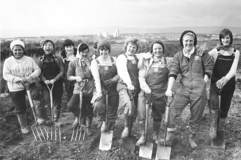A group of female landscapers from the Direct Works Department of the Cumbernauld Development Corporation at Palacerigg Country Park. The nature park at Palacerigg which opened in August 1974 is pictured with the New Town in the background.