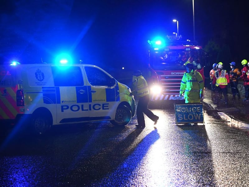 Police officers close a road in Brechin before River South Esk burst its banks.