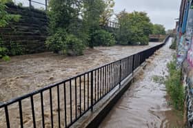 The River Sheaf at Heeley, Sheffield, where it burst its banks during Storm Babet, leaving River Sheaf Walk impassable