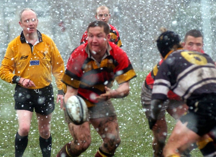 Sunderland and Houghton play on through a snow storm in 2005.
