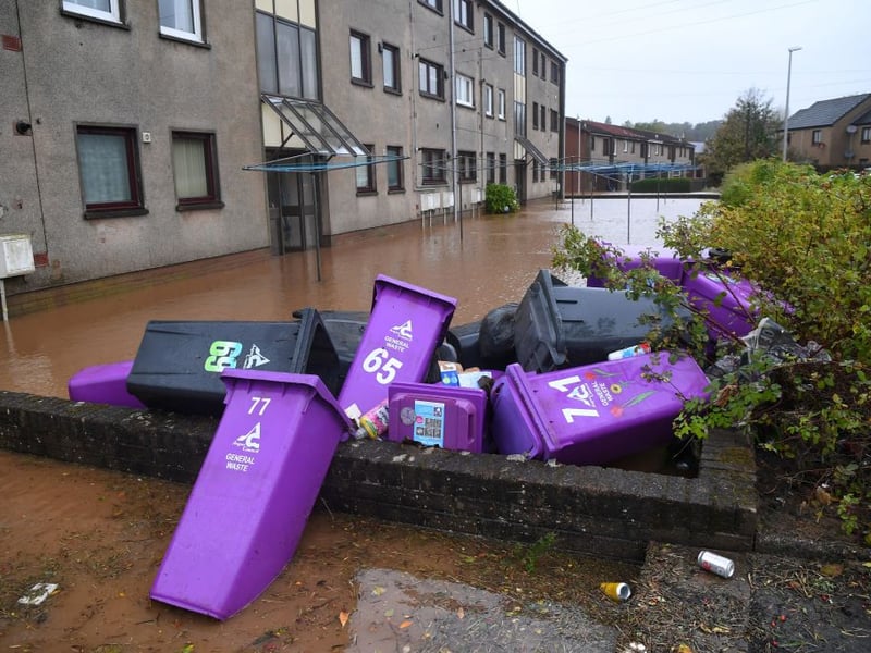 Rubbish bins were washed away by the force of the flooding.