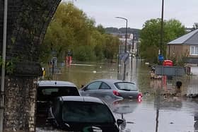 Cars submerged in flooded Catcliffe 