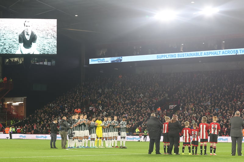 The Manchester United team takes part in a minute's applause in memory of Sir Bobby Charlton ahead of the Premier League match between Sheffield United and Manchester United at Bramall Lane