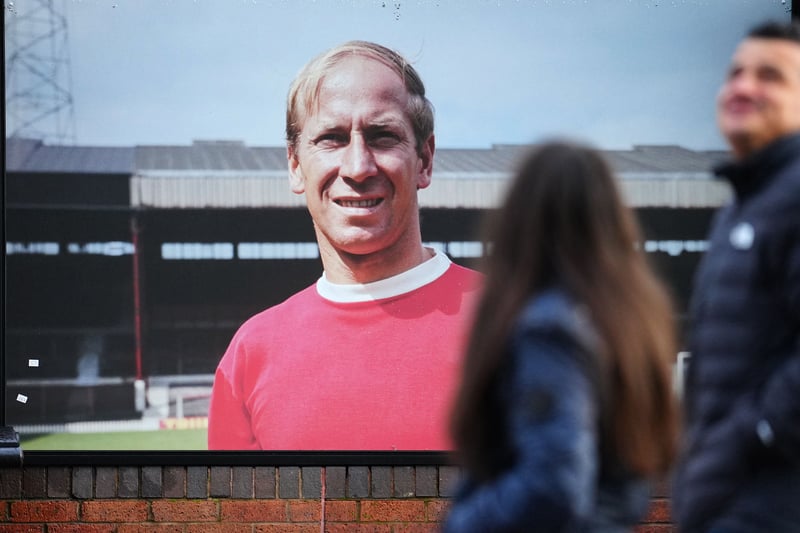 A big screen at Old Trafford shows a photo of Sir Bobby Charlton 