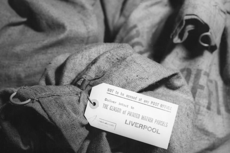 During WW II sacks for delivery to the censor. Labels on the sacks read, 'Not to be opened by any Post Office. Deliver intact to The Censor of Printed Matter parcels, Liverpool'. 