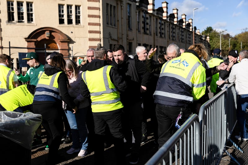 The Glaswegian fans under-going security measures as they enter Tynecastle