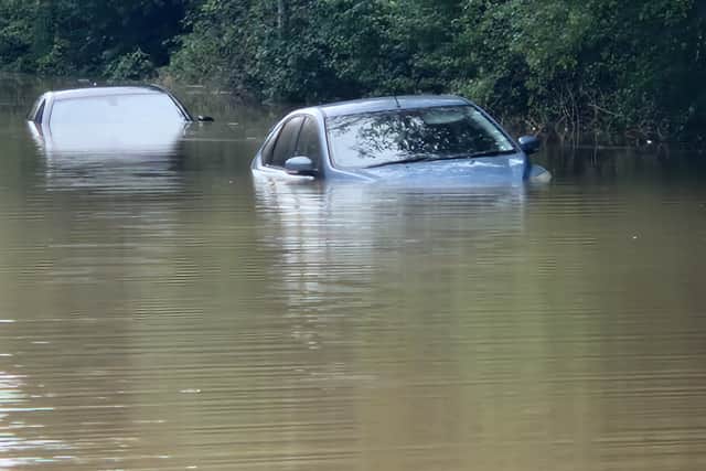 Cars are submerged in water in Catcliffe (Jon Middleton/JM photography)