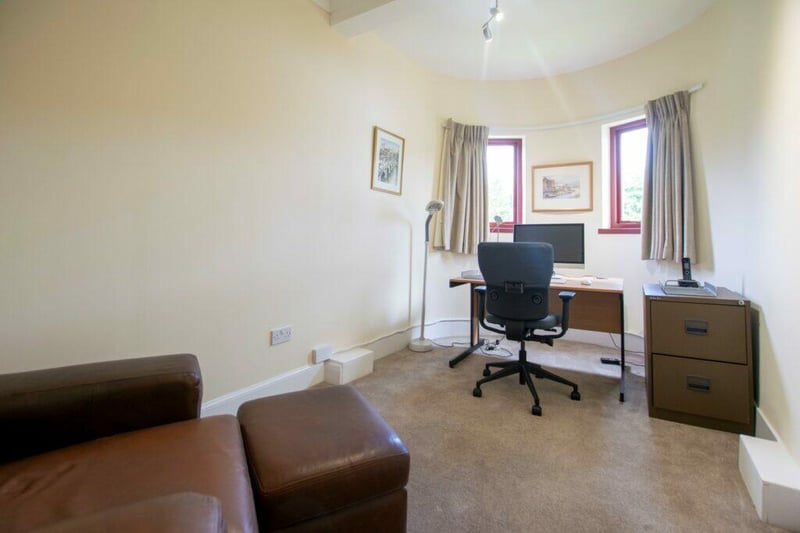 The office can be found in the front turret of the property - with views out on to the front garden and street.