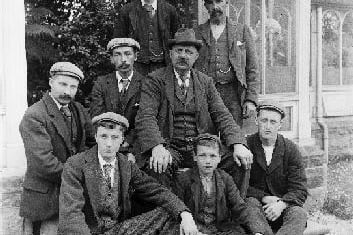 Estate workers at Earnock House - a group of men gathered outside greenhouseto have their photograph taken