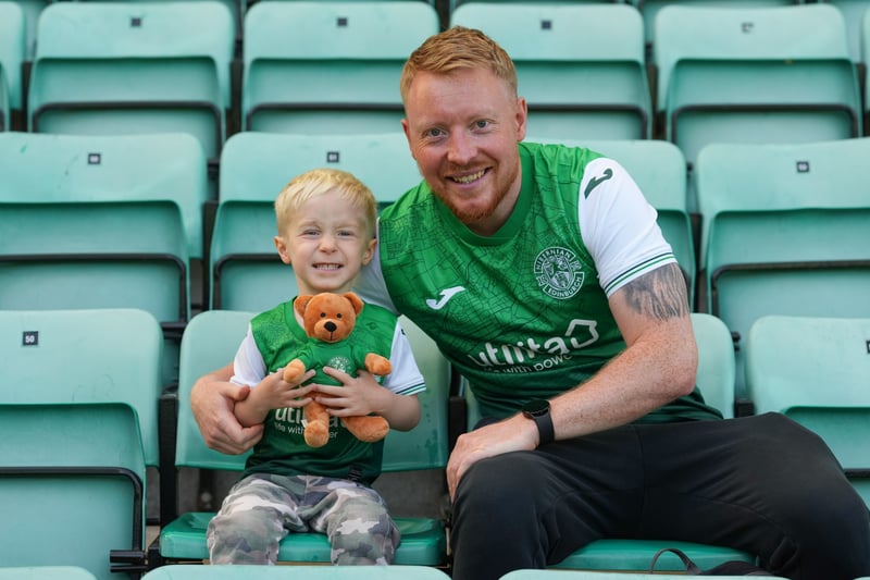 Hibs fans ahead of a clash against Livingston - this Hibs fan has even brought along an extra mascot for the Easter Road squad. 