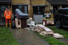 Janine and husband Jamie have had to discard all their belongings from their ground floor due to water damage.