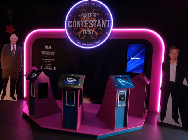 The Fastest Contestant First game in the new Gameshow All-Stars bar at Orchard Square, in Sheffield city centre. It is flanked by cardboard cut-outs of Chris Tarrant and Anne Robinson in a strange noughties TV quiz show version of good cop, bad cop!