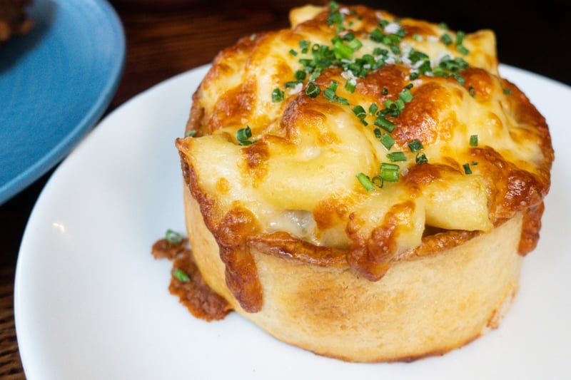 Try the ultimate cheesy snack at The Duke’s Umbrella whose macaroni pie is the perfect accompaniment to a drink. 