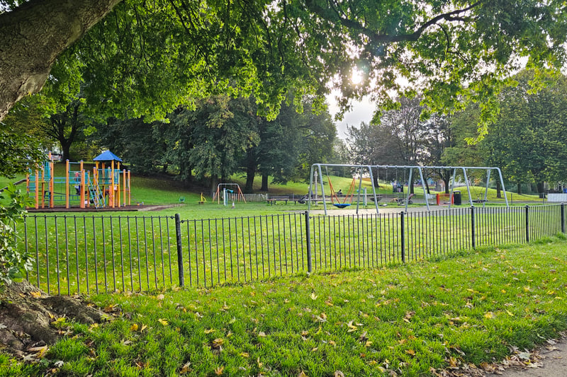 The play area includes swings, slides and climbing areas as well as benches for the guardians to sit whilst the children play.
