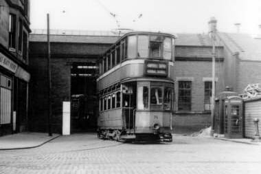 A tram heading out of the Maryhill depot on Celtic Street in 1958. 