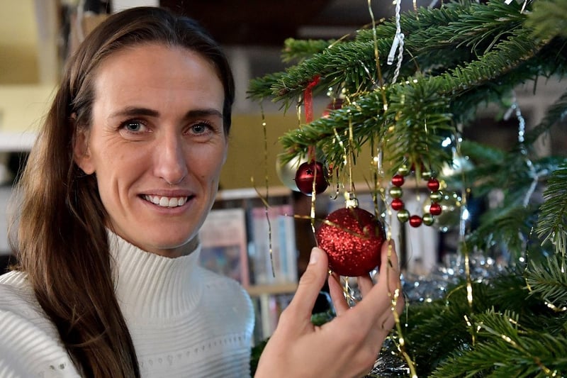 England footballer Jill Scott puts a decoration on the Fulwell Community Library Christmas Tree in 2019.
She won last year's series of I'm A Celebrity.