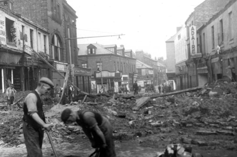 The bombs fell on Saville Street in September 1941 but locals were soon getting stuck into the clear-up operation. Photo: Shields Gazette