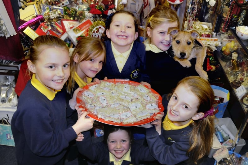 Fulwell Junior School pupils Lucy Archer 7, Lucy Goodings 8, Jamie Scrafton 7, Carys Kemp 8, Robyn Barker 7, and Eva Lowes 8 who sold reindeer dust to raise money for Pawz For Thought, in Fulwell Road in 2012.