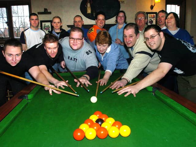 The Nellie Denes pub, in Chantry Bridge, Rotherham, where Landlady Georgina Bell is seen (centre) starting a pool competition to raise cash for the tsunami appeal in 2005. With her is the team taking part in the event