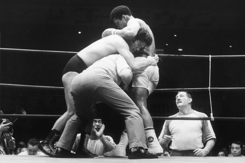 Crossover fights are often thought to be a modern idea which has manifested itself due to large social media attention.  However, even the great Muhammad Ali was involved in a crossover fight back in 1976 when he took on well renowned wrestler Antonio Inoki.  The fight was billed as the ‘War of the Worlds’ and it was fought under a peculiar set of rules which prevented Inoki from wrestling his opponent, whilst simultaneously allowing him to lie on his back and kick Ali.  The bout was heavily criticised by the press at the time and ESPN even claims that fans in attendance threw debris into the ring and chanted, “Money back! Money back!”  The 15 round contest was controversially scored as a draw. (Getty Images)