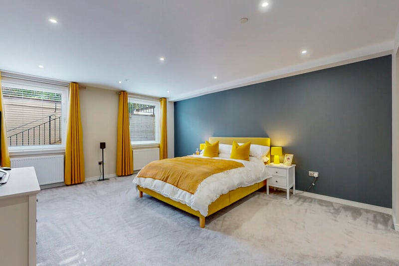 The principal bedroom is a comfortable space that is generous in size. 
