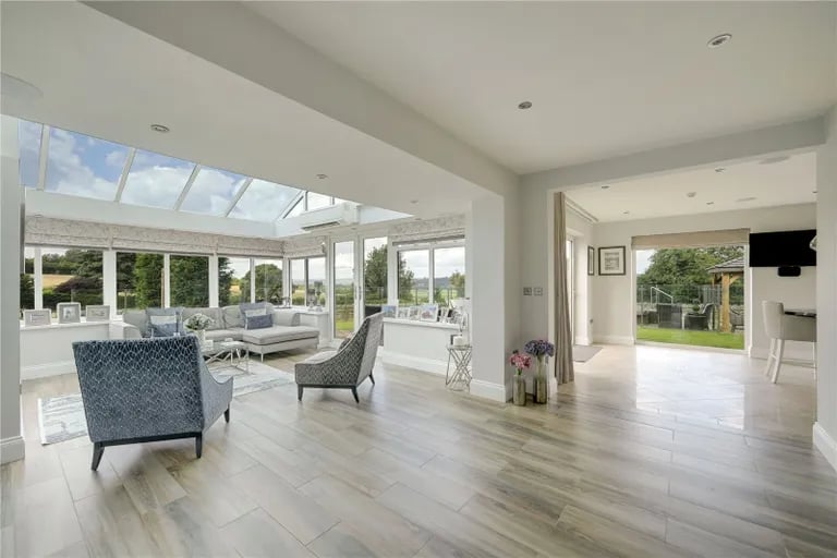 The heart of the property is this open garden room and dining area.