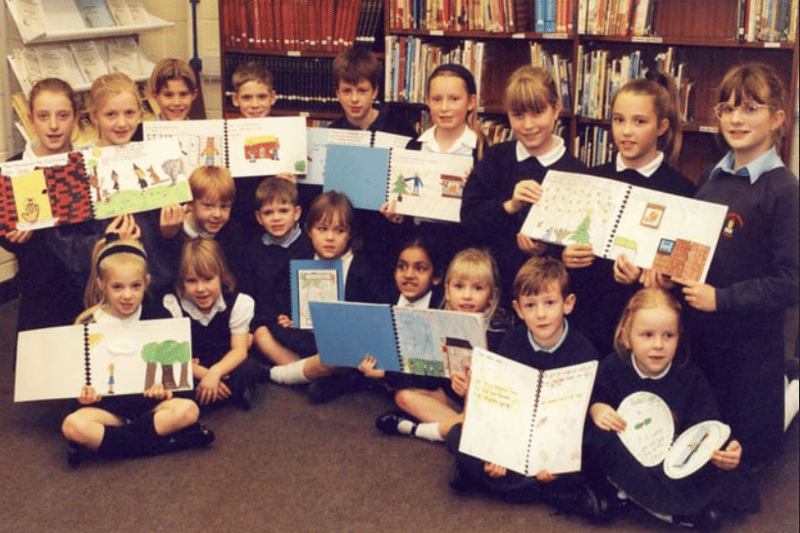 Mortimer Primary schoolchildren show off their home-made books in January 1995. Who can tell us more about the work they did? Photo: Shields Gazette