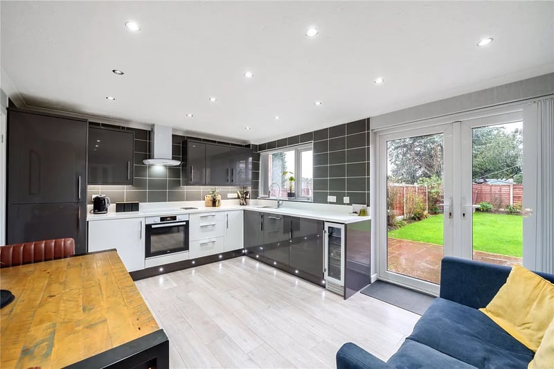 On the ground floor is also this modern fitted kitchen with access to the rear garden.