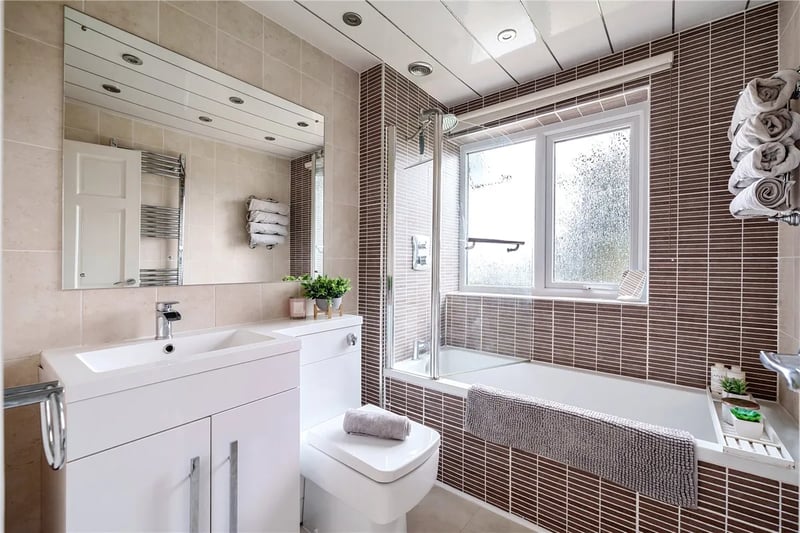 The modern family bathroom with bathtub.