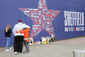 Flowers have been laid at the Utilita Arena Sheffield following the tragic death of ice hockey player Adam Johnson during an on-ice collision in a match against the Sheffield Steelers on Saturday night
