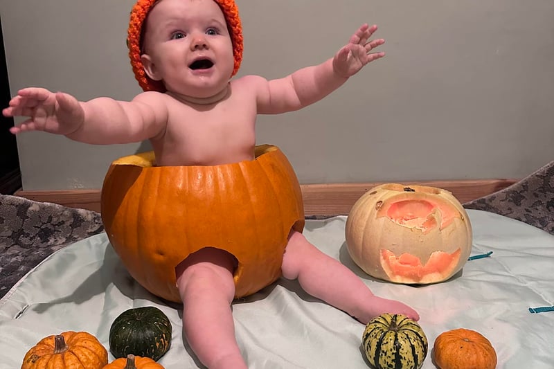 Freya, 10 months enjoying her first Halloween in a pumpkin
Credit: Charlene Lamond