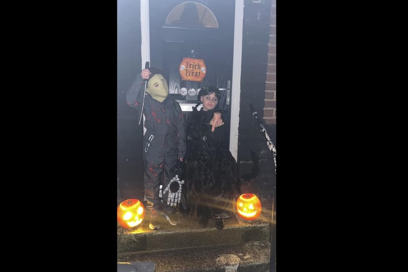 Top marks for the two in this photo by Jamie Leigh Antcliffe of a two youngsters staying totally in character for their picture as Michael Myers and Wednesday Addams. 