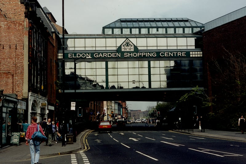 A view of Eldon Garden Percy Street Newcastle upon Tyne taken in 1995. The photograph shows the covered bridge which spans Percy Street and links Eldon Garden with Eldon Square Shopping Centre (Newcastle Libraries)