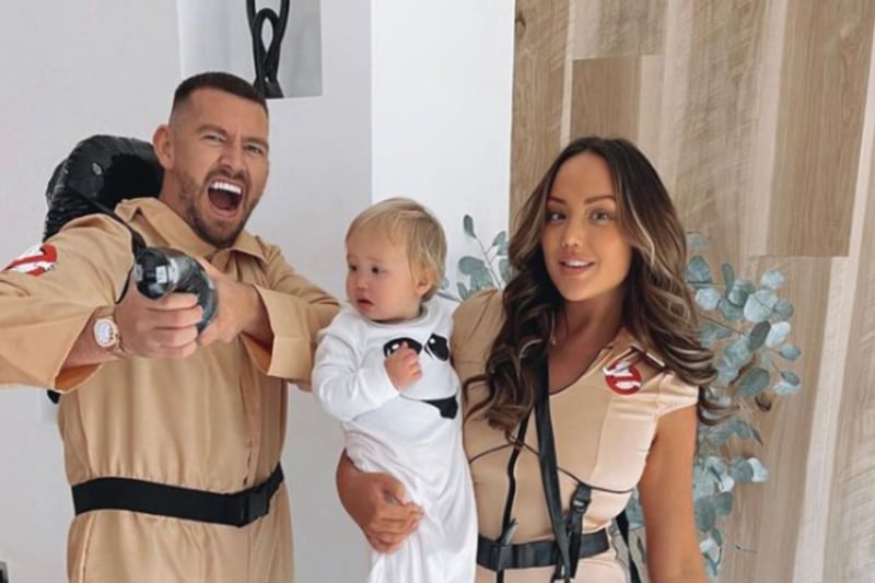 Charlotte Crosby, alongside her partner Jake Ankers dressed up as Ghostbusters, with their young daughter in a ghost costume.