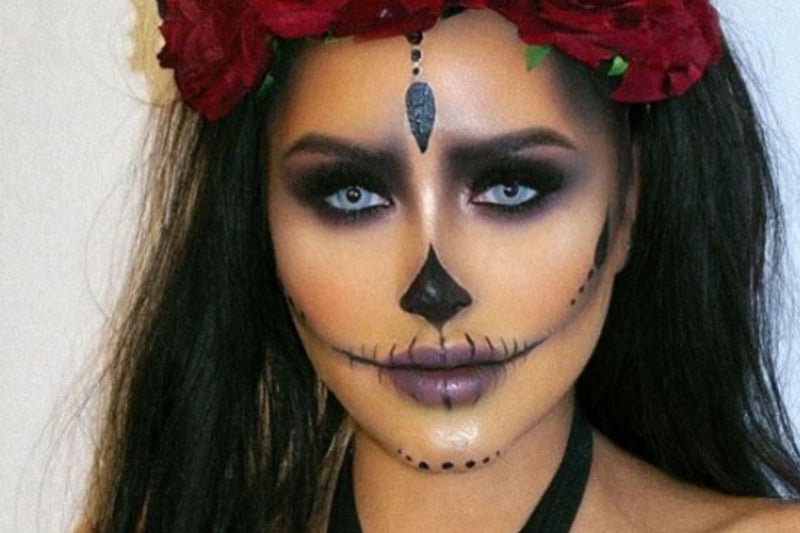 Marnie Simpson wore a day of the dead look, with intricate face paint and rose headband.