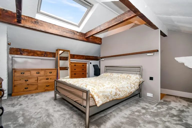 On the second floor is this large double bedroom with ensuite bathroom.