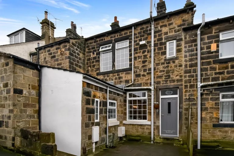 This four bedroom stone cottage is on the market.